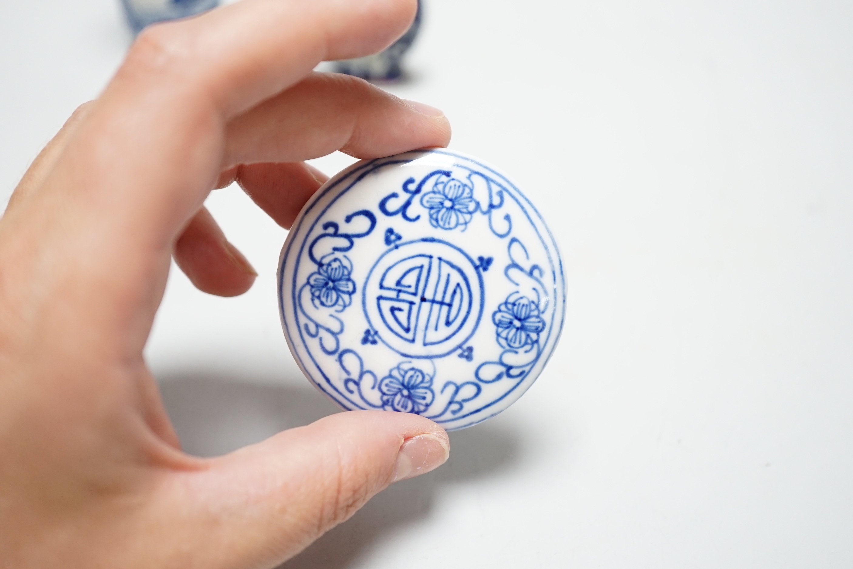 Two Chinese snuff bottles, a porcelain mounted white metal box, mother-of-pearl counters etc